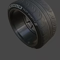 Car Tire With Modern Alloy Wheel Rim Black Spoke Design And Branded Sidewall
