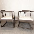 Modern Single Chair Featuring Square Armrest Frame Vertical Slat Back And Light Padded Seat