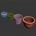 Set of Four Colorful Decorative Flower Pots with Textured Surfaces and Assorted Colors