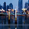 Urban Road Facilities With Modern Street Lamps And Wet Road Surface At Night