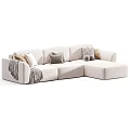 Cozy Light Colored L Shaped Sofa With Soft Cushions And Warm Blanket