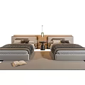Two Single Beds In Bedroom With Nightstand Lamp Pillows Blanket On Rug And Open Book