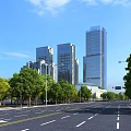 Modern High Rise Office Buildings In Cityscape With Trees And Road Under Blue Sky