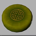 Green Circular Decorative Piece With Intricate Yellow Geometric Pattern In Center