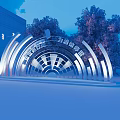 Colorful Illuminated Arch Garden Ornament Decorating Landscape with Trees and Modern Building
