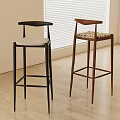 Modern Bar Stools With Black And Brown Frames And Patterned Seats Near Window Blinds