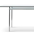 Modern Transparent Glass Table With Sleek Chrome Metal Legs And Minimalist Design