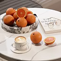 Fresh Oranges In Marble Bowl On White Marble Table With Coffee Cup And Book