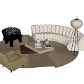 Curved Beige Upholstered Sofa And Coffee Table Set With Area Rug And Floor Lamp