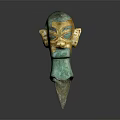Ancient Greenish Bronze Mask Featuring Golden Accents And Intricate Facial Details