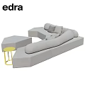 Modern Gray Curved Sofa With Yellow Side Table And Modular Seating Cushions