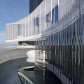 Modern Sales Office Building with Water Reflection Surrounded by High Rise Buildings and Greenery
