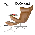 Modern Brown Leather Leisure Chair With Ottoman Floor Lamp And Side Table Books
