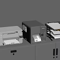 Office Equipment With White Printer Gray Label Printer And Black File Holder On Gray Cabinet
