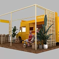 Yellow Food Truck Setup With Wooden Frame Structure Tables Chairs And Green Plants People Sitting
