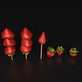 Fresh Juicy Red Strawberries Skewers And Whole Strawberries Against Black Background