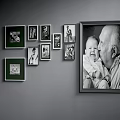 Photo Wall with Multiple Black and White Family Frames Gray Wall Grandfather and Baby Portrait