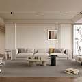Modern Living Room Interior With Beige Sofa Round Coffee Table Wall Art And Window Plant