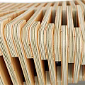 Modern Woven Rattan Outdoor Chair With Ergonomic Curved Design For Patio Use