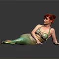 Red Haired Woman In Green And Yellow Mermaid Tail Lying On Black Smooth Surface