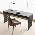 Modern Black Desk With Table Lamp Books And Brown Chair By Window Blinds
