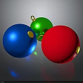 Colorful Christmas Balls In Blue Green Red With Golden Loops On Dark Background And Reflections