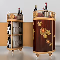 Elegant Round Wheeled Wine Cabinet With Open Doors Red Wine Bottles Glassware And Decorative Flowers