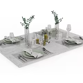 Elegant Dinnerware Set With Green Plates Napkins Wine Glasses And Vases