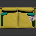 Modern Yellow Double Sofa With Green Cushions And Patterned Blanket On Armrest