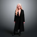 Woman With Long Blonde Hair Standing In Black Coat And Black Boots On Gray Background