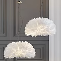 White Feather Like Chandeliers Hanging In Modern Interior With Dark Cabinetry