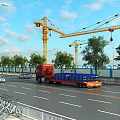 Functional Truck Driving On Urban Road Near Construction Site With Cranes Trees And Bicycles
