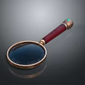 Elegant Magnifying Glass With Red Handle Golden Frame And Green Gemstone Accent