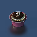 Delicious Chocolate Frosted Dessert Pastry In Pink Cup With White Sprinkles On Top