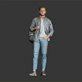 A Young Man Standing in Casual Outfit With Plaid Shirt White T-Shirt Jeans and Backpack