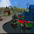 Amusement Park With Colorful Boats In Water Pool And Roller Coaster Near Blue Cabin
