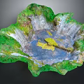 Lush Garden Landscape Design With Green Vegetation Blue Pond Yellow Pathway And Rolling Terrain