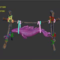 Purple and pink fish hanging on wooden structure made with sticks and ropes
