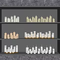 Various Candle Lamps Arranged On Black Layered Shelves For Home Interior Decor