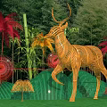 Check-in Photo Spot Featuring Large Woven Deer Sculpture Green Wavy Backdrop And Colorful Palm Leaves