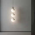 Modern Minimalist Pendant Light With Three White Spherical Lampshades In Interior Display Area