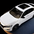Modern White Sedan Car Featuring Sleek Exterior And Alloy Wheels On Display Stand