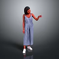 A woman in blue checkered jumpsuit pointing against gray background with white shoes