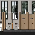 Public Restroom With Wooden Stalls Windows Trees Outside Grab Bars And Gray Tile Flooring