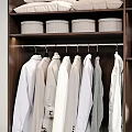 Organized Wardrobe Interior with Hanging Clothes Shoes Bags Drawers and Storage Boxes