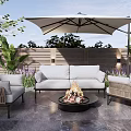 Comfortable Outdoor Sofa With Wicker Chairs Fire Pit And Umbrella For Cozy Patio Garden Setting