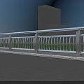 Modern Metal Railings With Curved Design Along Urban Road Near High Rise Buildings And Grass