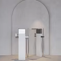 Sleek Silver Faucets With Long Metal Pipes In Arched Niche On Light Gray Wall