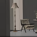 Floral Fabric Accent Chair with Black Legs by Round Table Vase and Floor Lamp