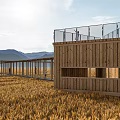 Wooden Pavilions In Golden Wheat Field With Hills And Trees Background